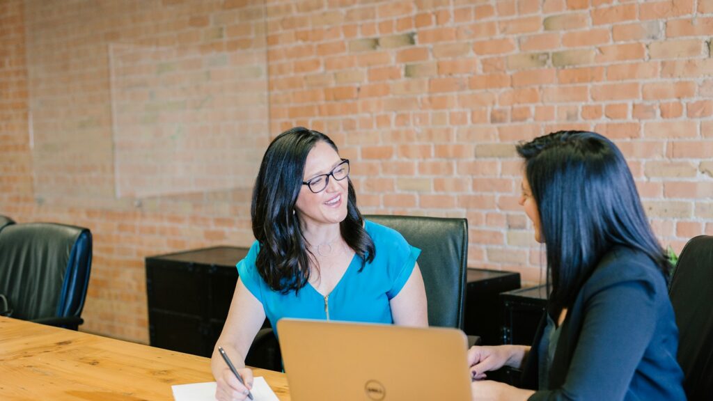 Immigration attorney meeting with a young client about Special Immigrant Juvenile Status