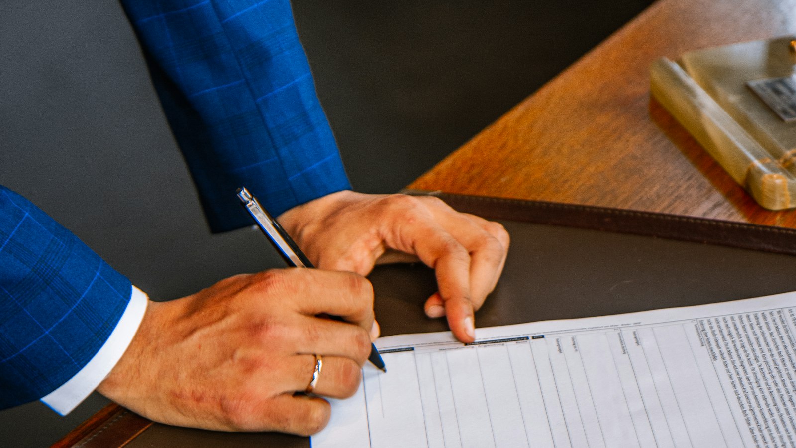 Applicant completing immigration paperwork such as Form I-360